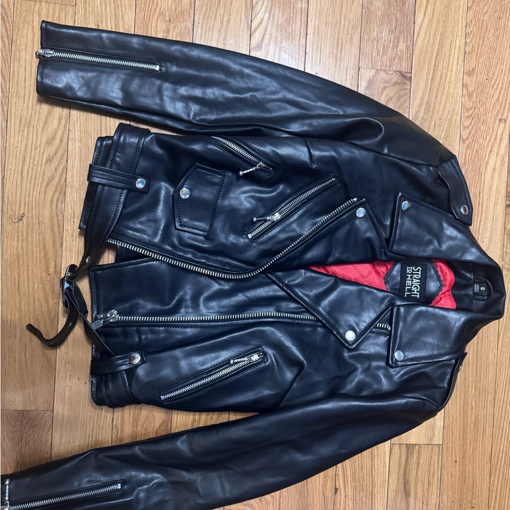 Sleek Black Leather Jacket with Vibrant Red Lining
